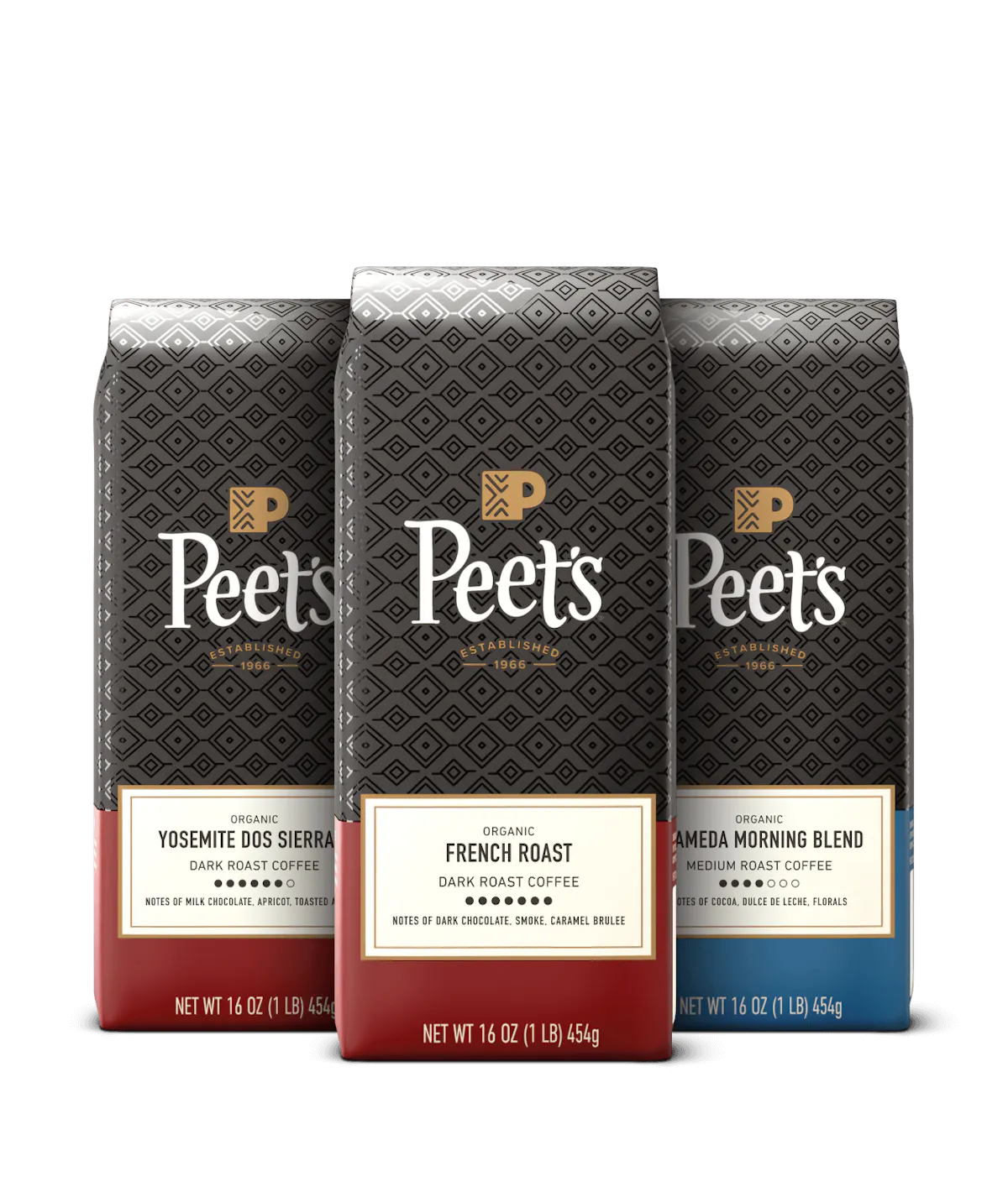 Three Peet's organic coffee bags with different blends on a black background
