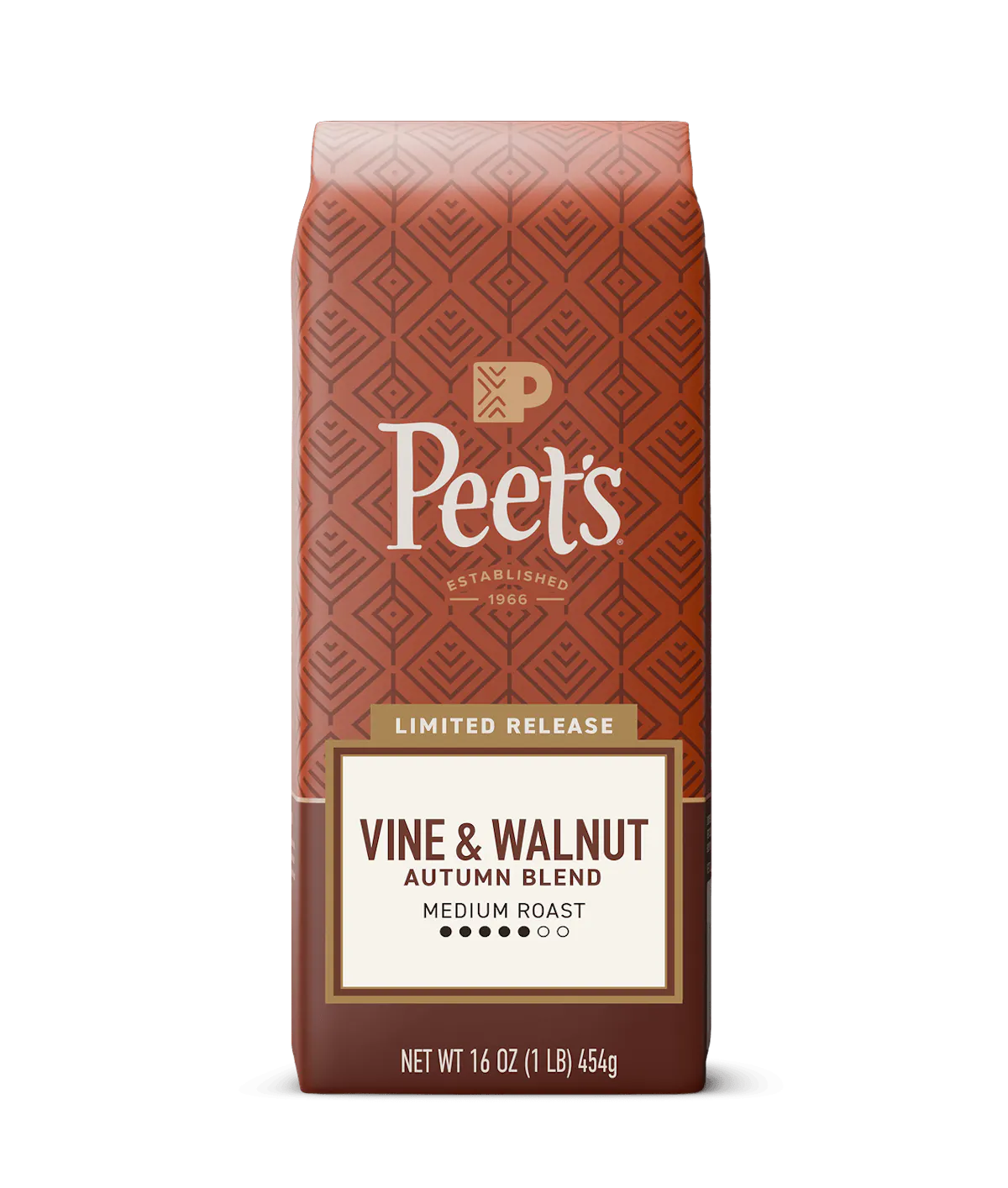 Peet's Vine & Walnut Autumn Blend coffee bag in a limited release medium roast, 16 oz. The packaging features a terracotta patterned background with a cream and brown label at the bottom, set against a solid dark green background.